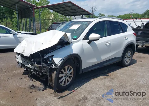2014 Mazda Cx-5 Touring from USA, damaged, VIN JM3KE4CY3E0306319